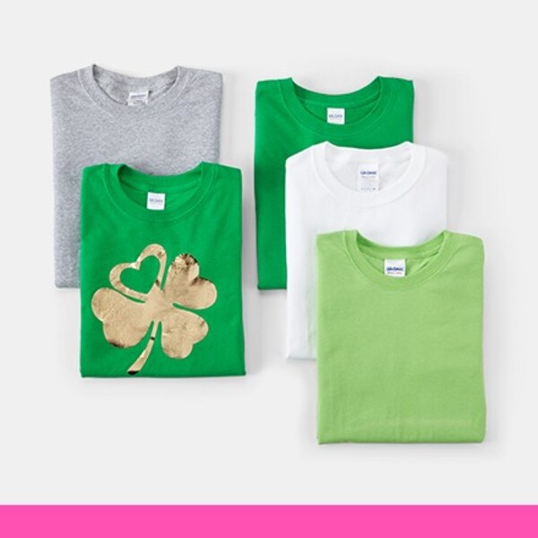 grey, white and green folded t-shirts